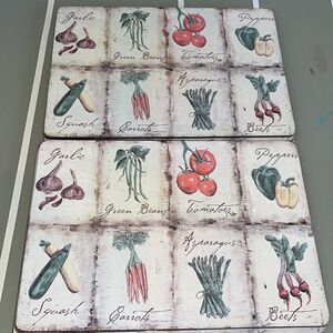 Two (2) used Retro Vegetable garden corked backed hard dinner table Placemats